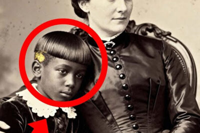 This 1870 Portrait of a Mother and Son Looks Tender Until You Notice the Boy’s Hair
